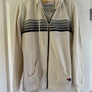 Cream Aviator sweater shirt with gray and black stripes